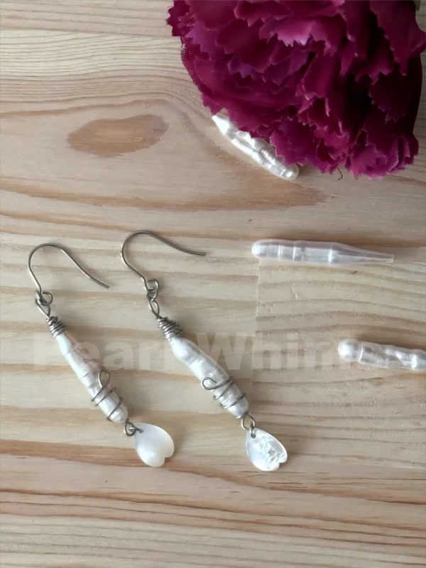 Close-Up of Mermaid Earrings – Textured Ribbed Baroque Pearl & Shimmering Mother-of-Pearl Fishtail on Surgical Steel