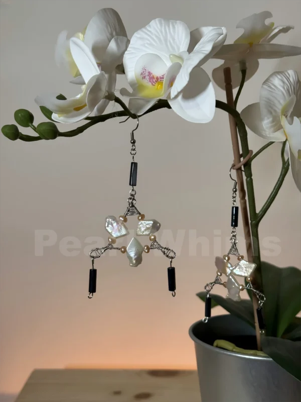 Close-Up of Rotating Baroque Pearl Fish on Steel Triangle, Hypoallergenic Art Jewelry